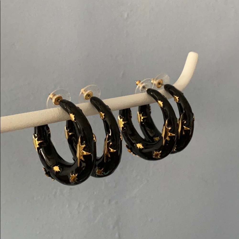 Black and gold star BaubleBar earrings